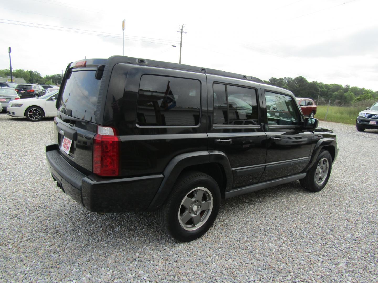 2007 Black /Gray Jeep Commander Sport 2WD (1J8HH48P37C) with an 4.7L V8 SOHC 16V FFV engine, Automatic transmission, located at 15016 S Hwy 231, Midland City, AL, 36350, (334) 983-3001, 31.306210, -85.495277 - Photo#7